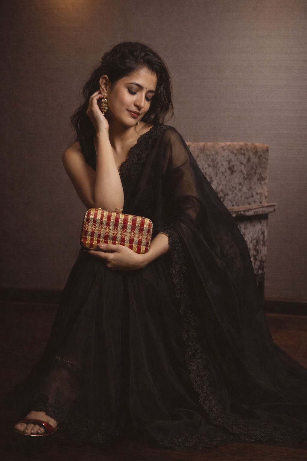 Assam silk clutch bag with traditional motifs