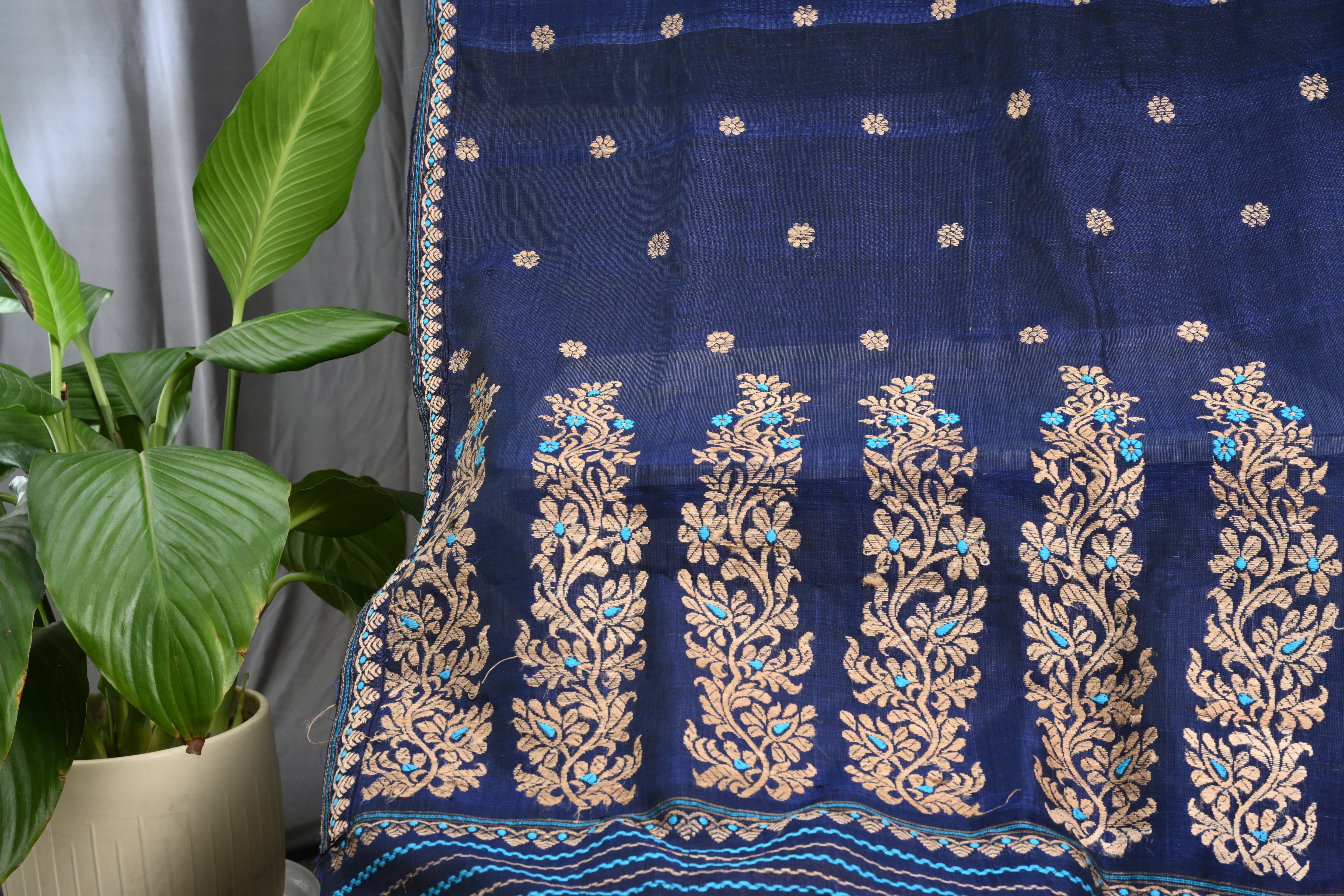 Navy Blue Raw Cotton Mekhela Sador with Muga Ghecha Thread Motifs