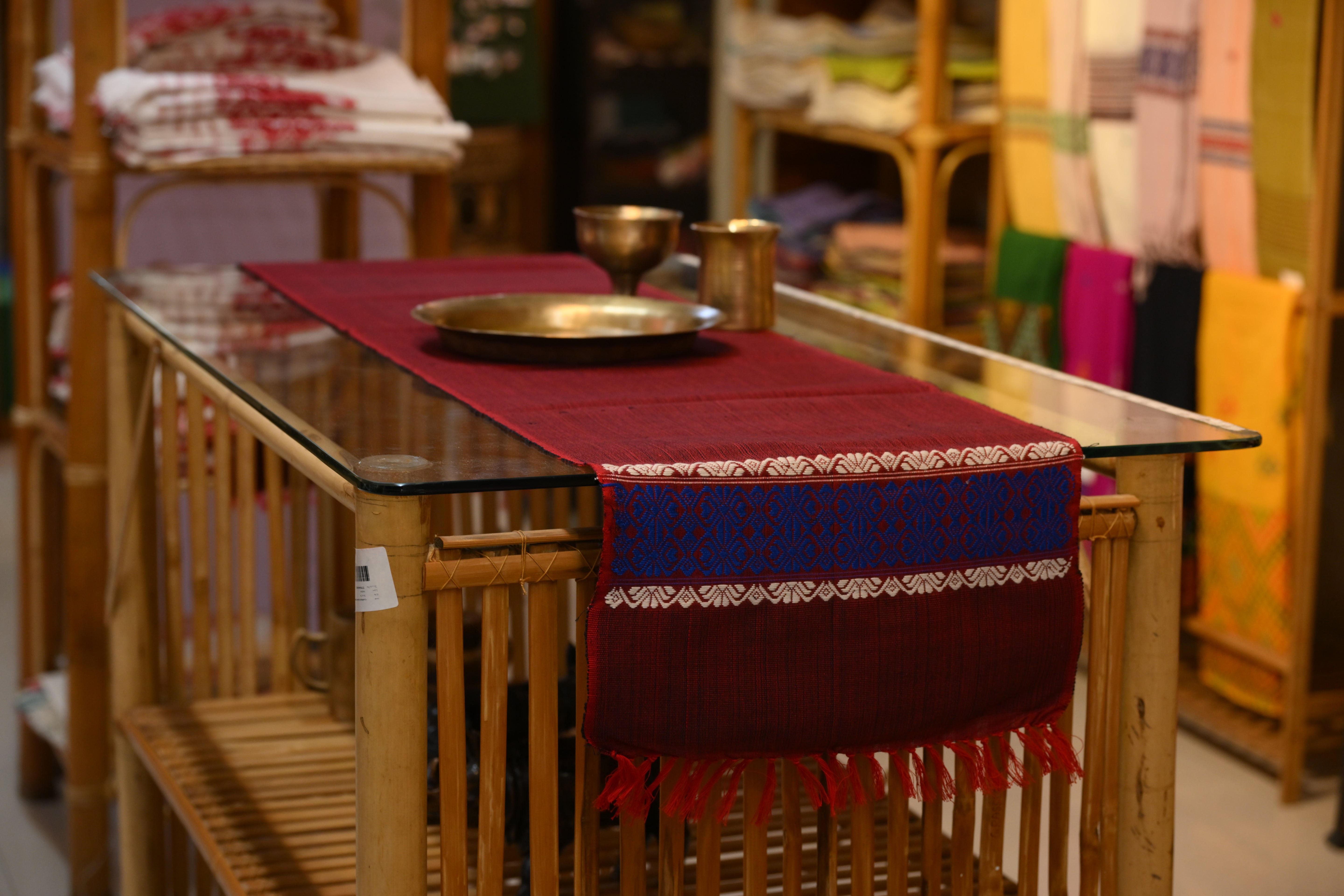 Handwoven Assamese Table Runner – Maroon with Blue Border Motifs