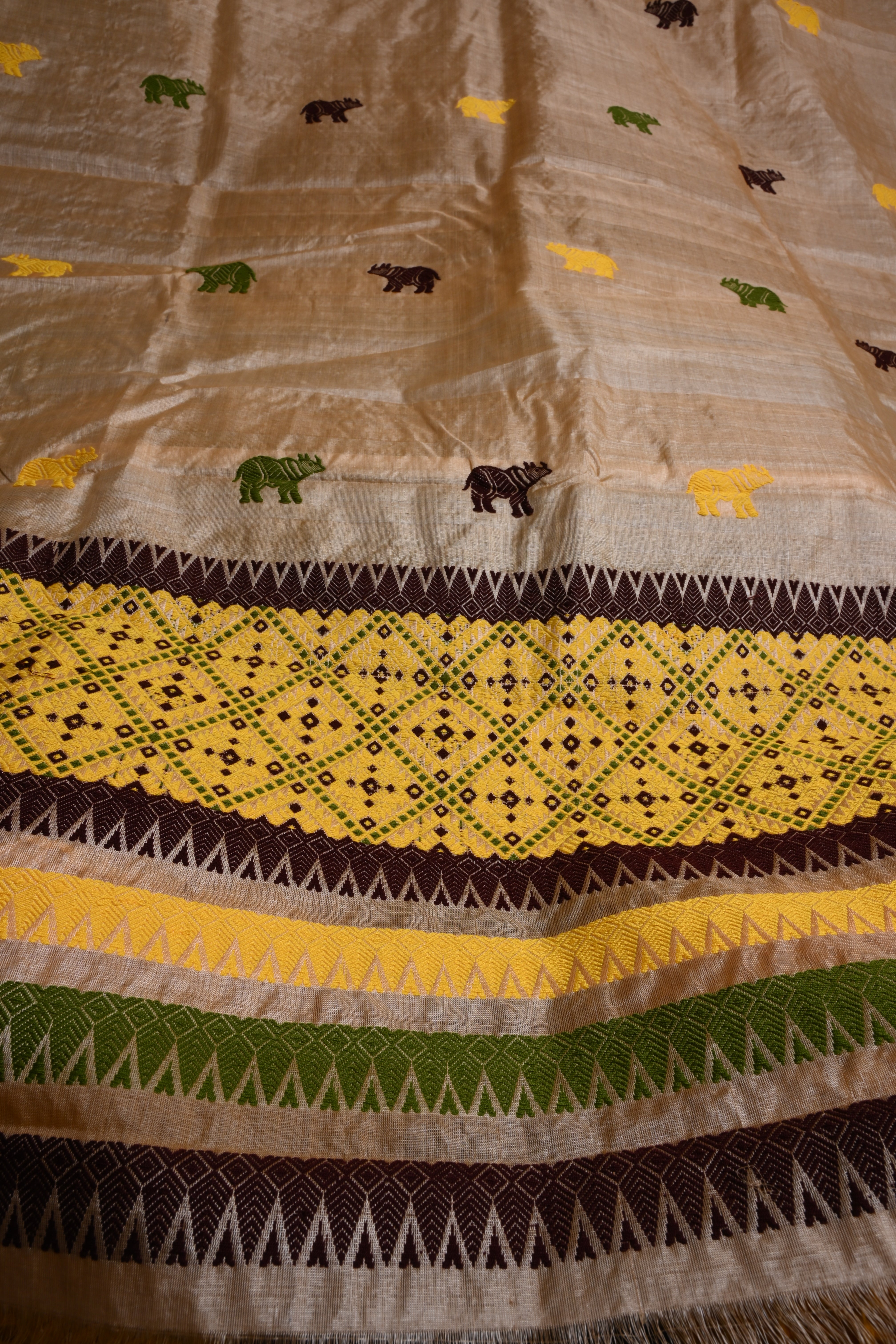 Tussar Mekhela Sador with Handwoven Rhinoceros Motifs