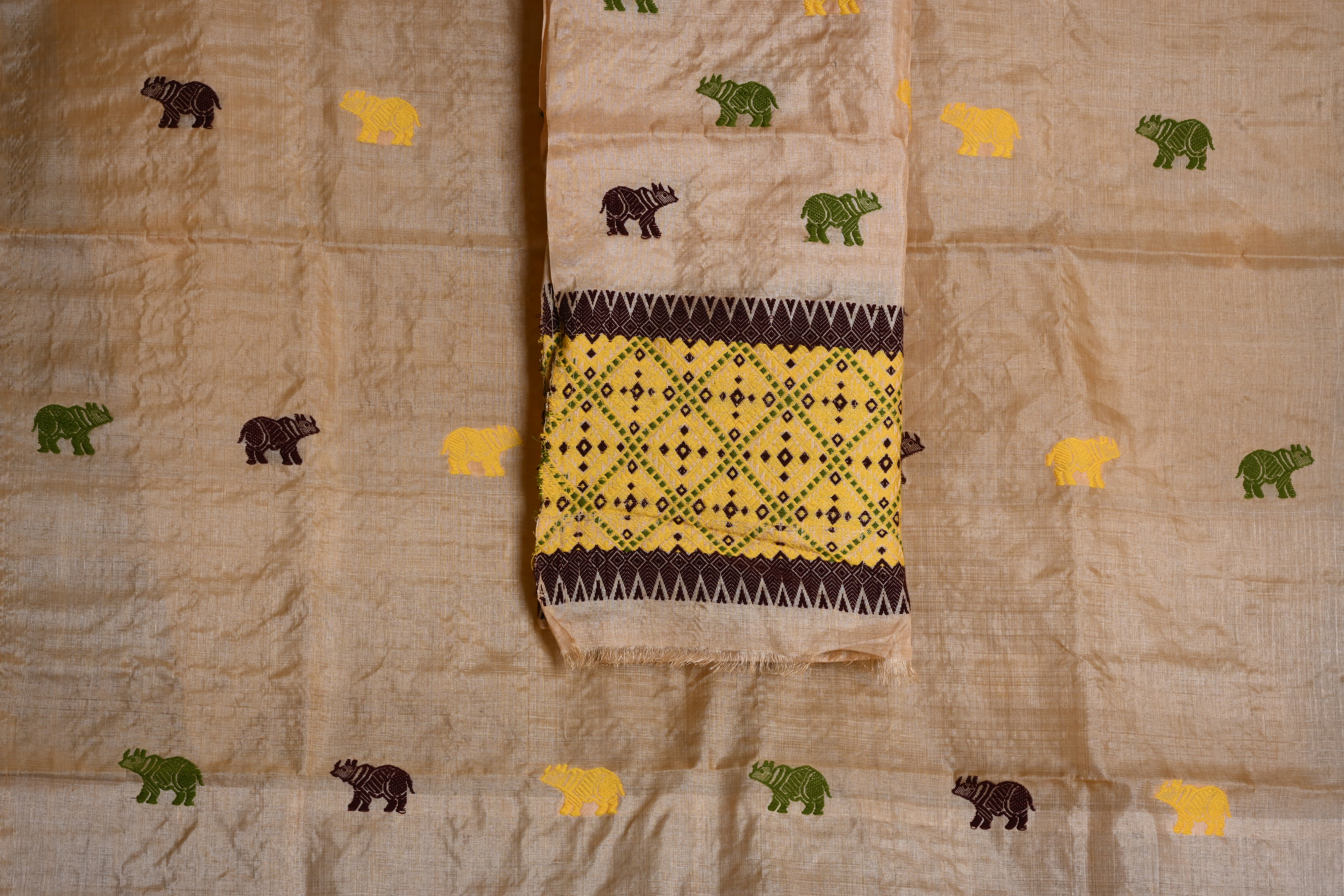Tussar Mekhela Sador with Handwoven Rhinoceros Motifs