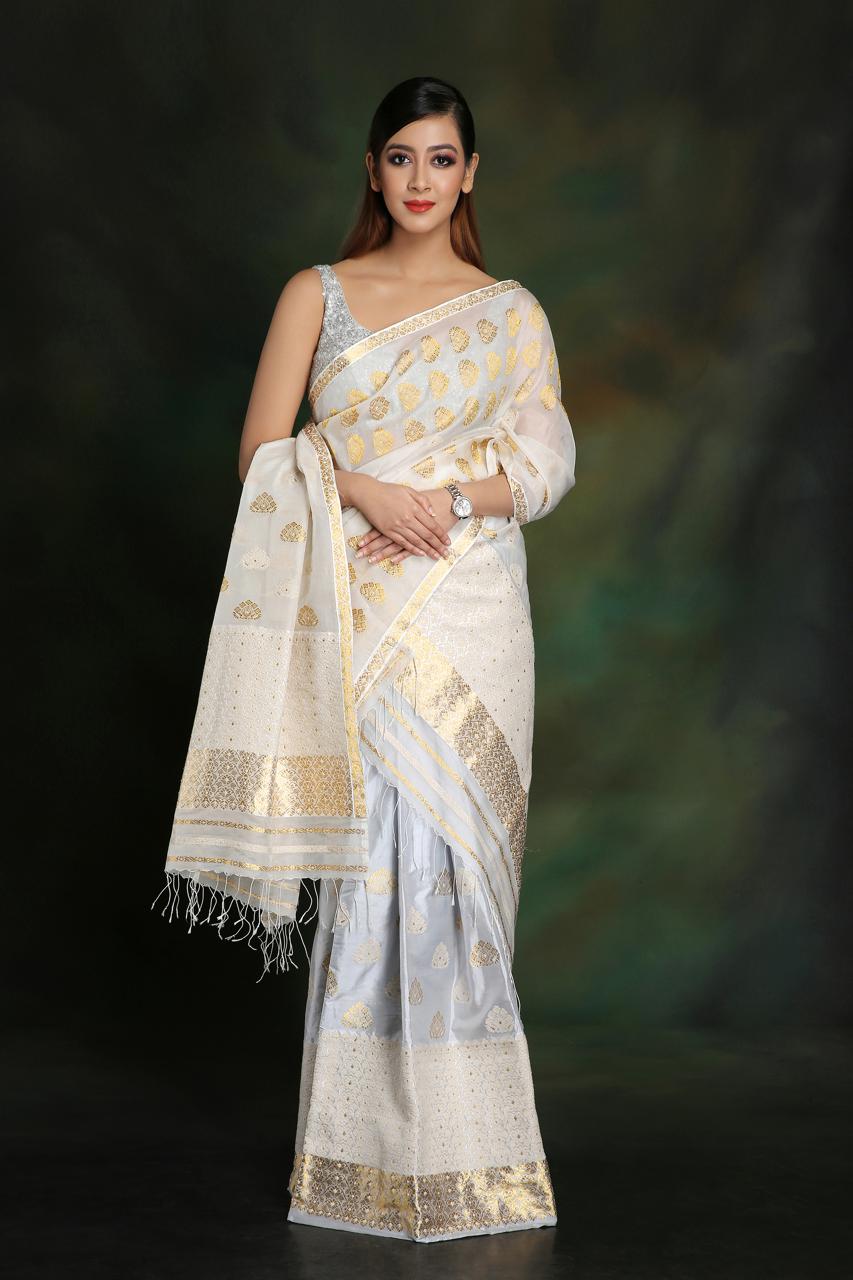 Ivory Raw Silk Chador & Silver Pat Silk Mekhela with Guna, Eri Motifs & Eri-Woven Borders