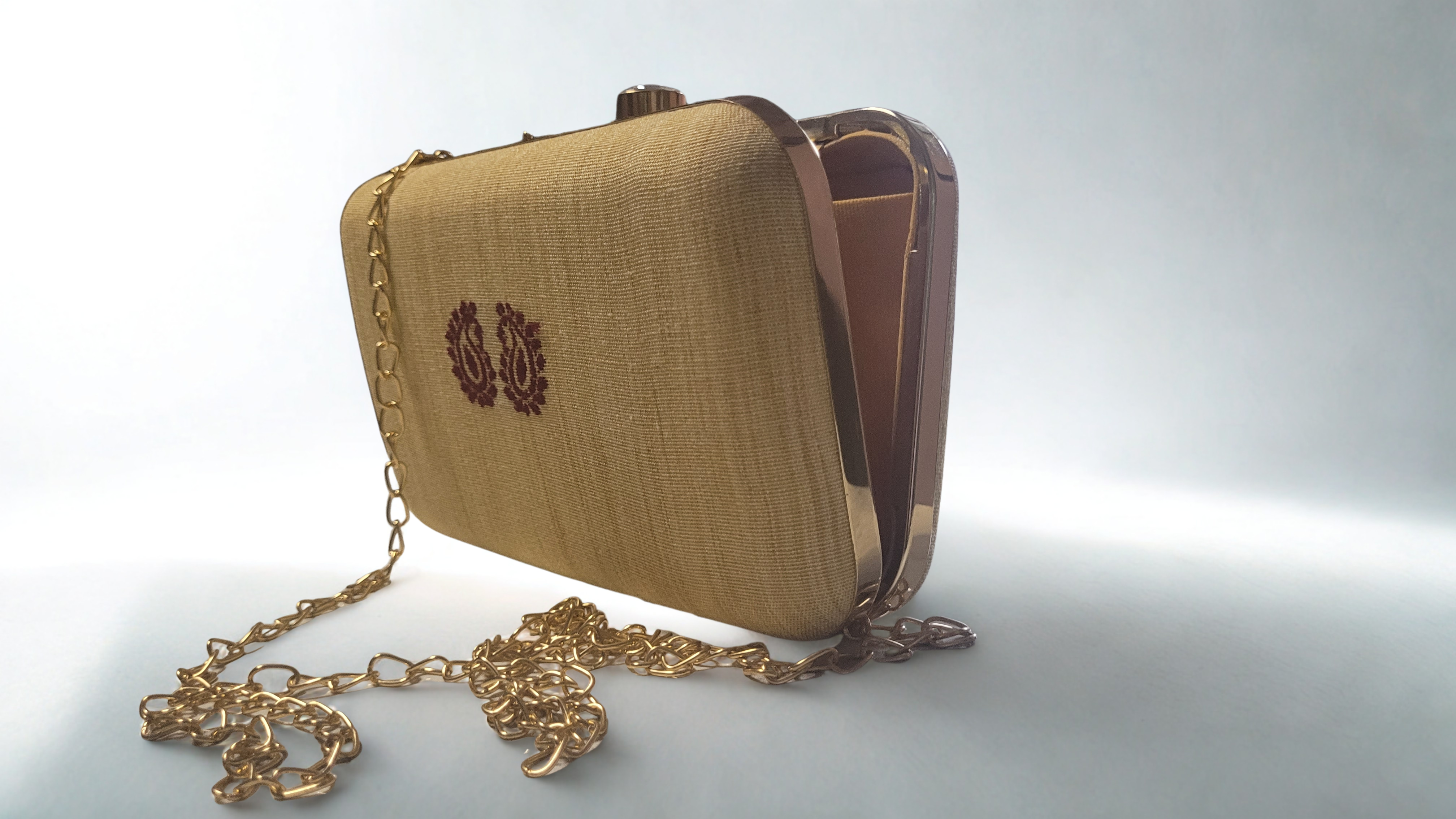 Silk Clutch Assam Gheecha with small Kolka motif